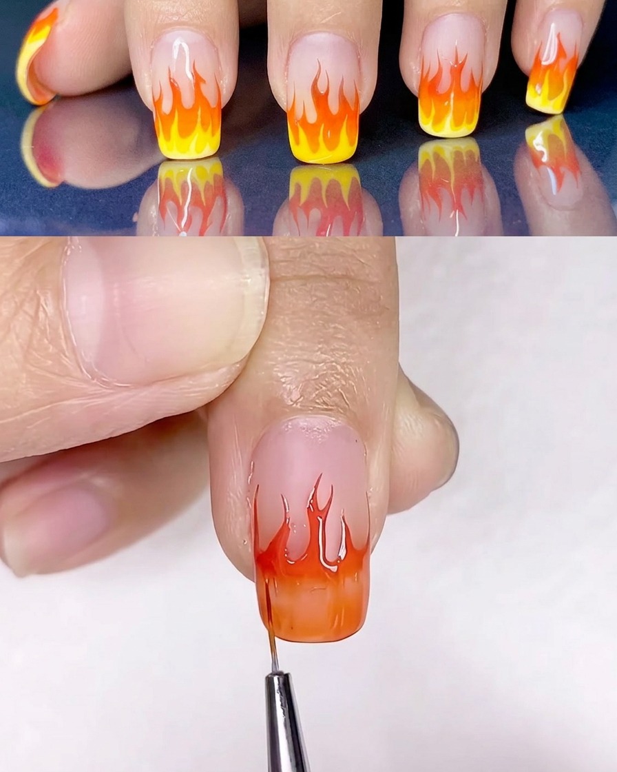 Pincel plano difuminando el esmalte de gel amarillo y naranja sobre la superficie de la uña.