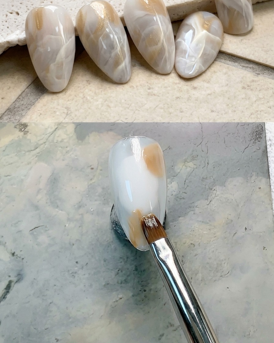 Primer plano de una uña con un punto de gel marrón aplicado en la sección superior derecha.