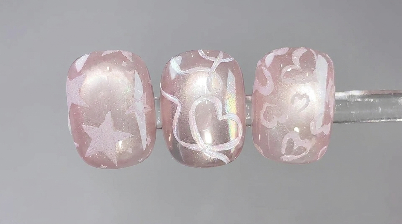 Tutorial de manicura: Uñas cat-eye rosas con estampados