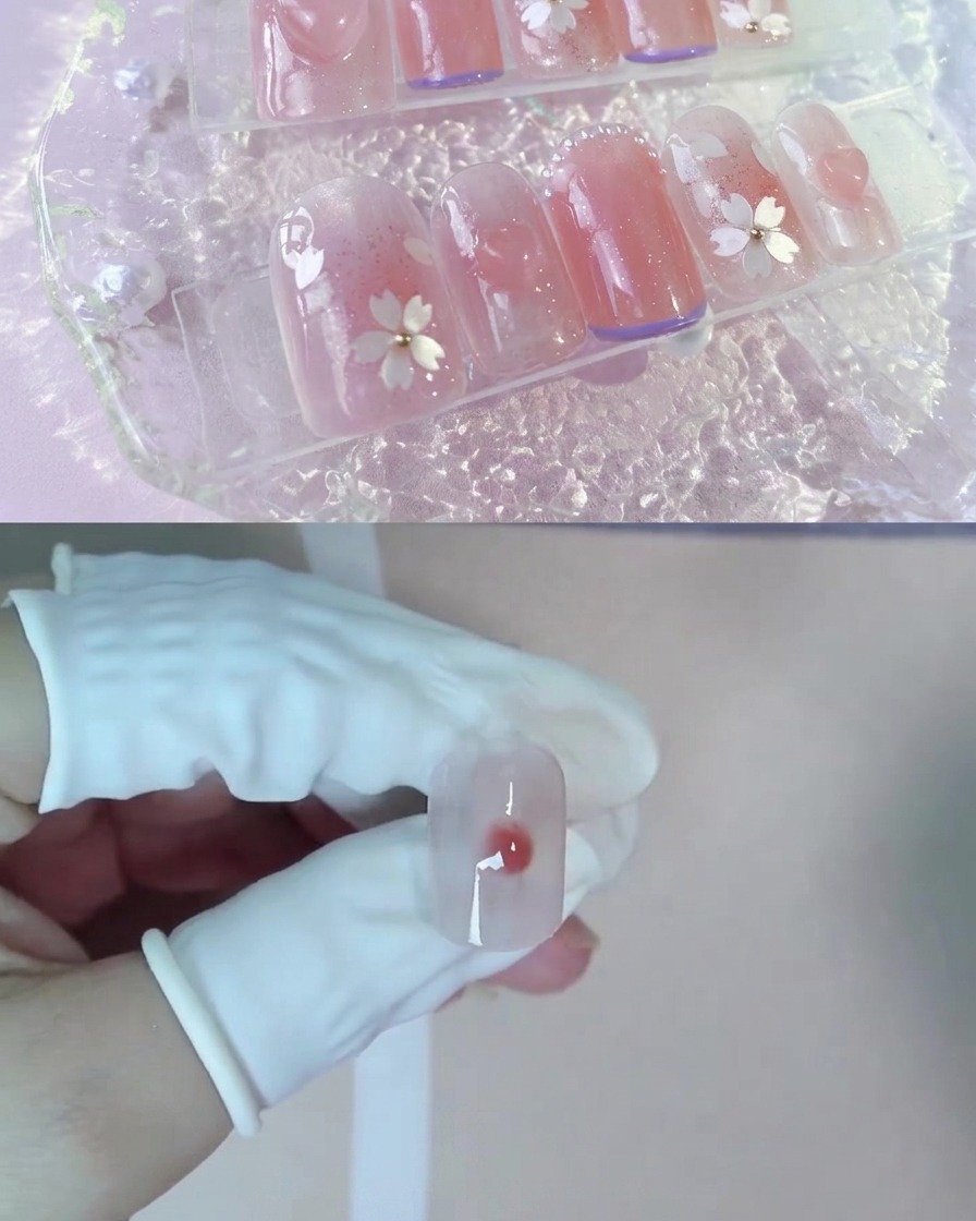 Una gota de gel melocotón nude más oscuro en el centro del gel de expansión húmedo sobre una uña.