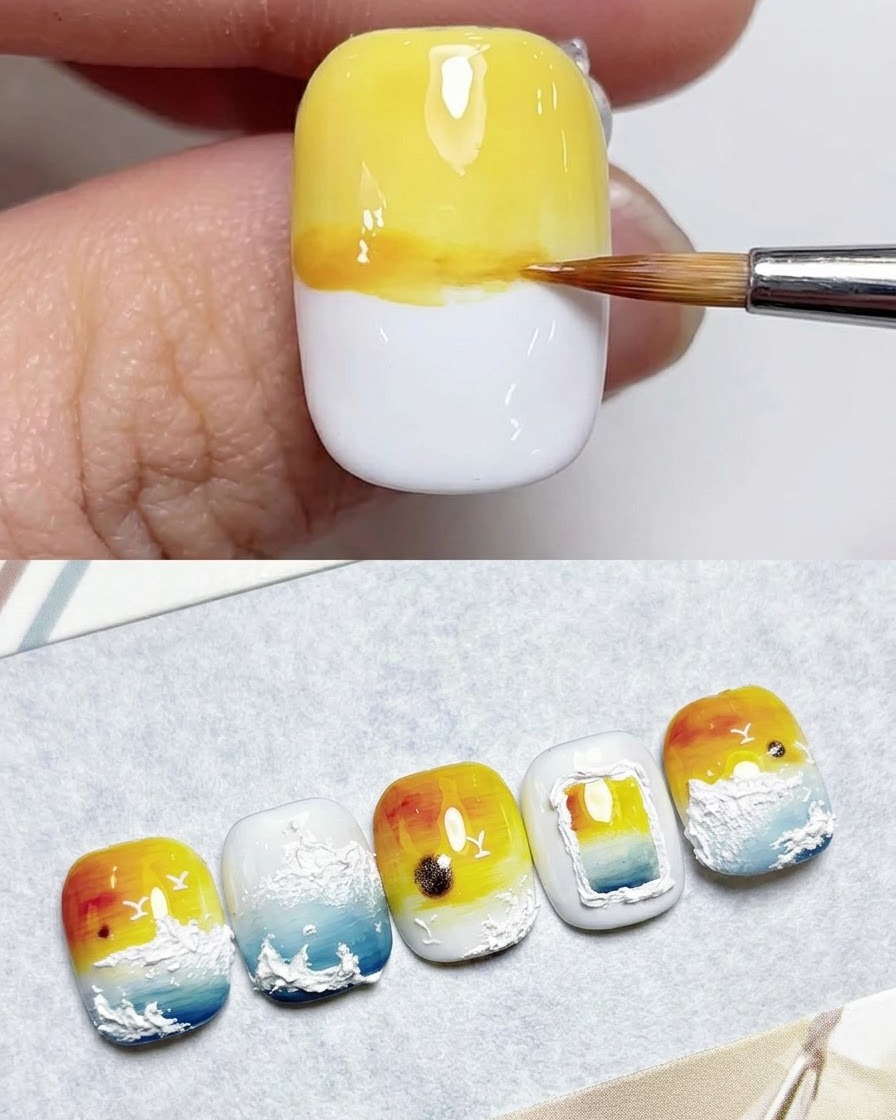 Un pincel de sierra difuminando gel amarillo pálido en la porción superior de una uña blanca.