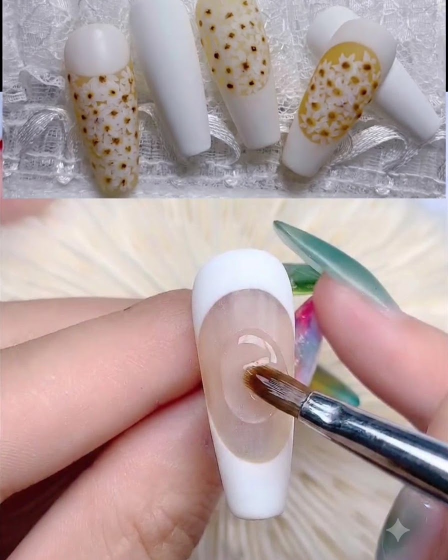 Un pincel aplicando una base de gel semi-transparente de color amarillo claro sobre un tip de uña.