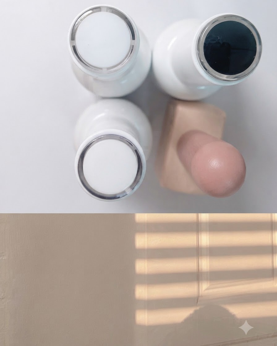 Un espacio de trabajo que muestra frascos de esmalte en gel blanco, azul y negro dispuestos ordenadamente junto a una paleta limpia de mezcla de colores.