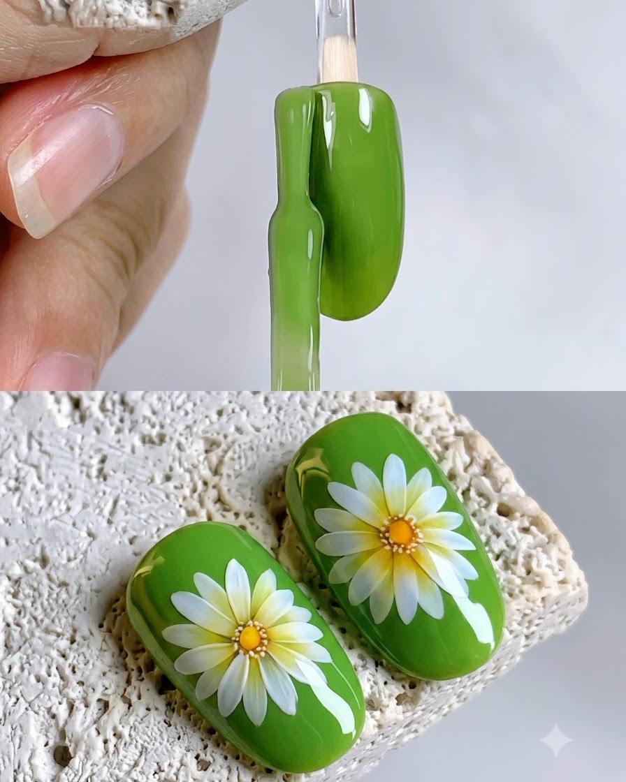 Un pincel de uñas aplicando esmalte de gel verde vibrante sobre la superficie de una muestra de uña ovalada.