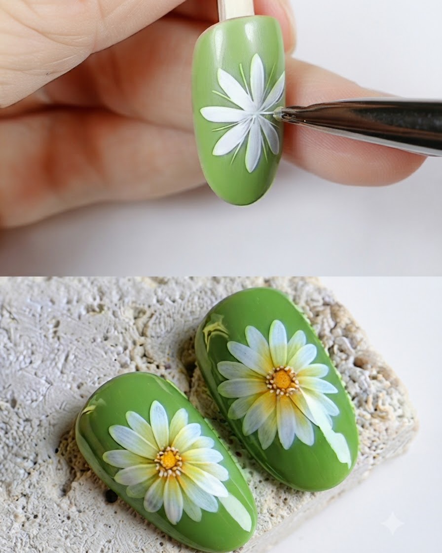 Un recipiente abierto de gel de color amarillo junto a una uña verde que presenta una flor de margarita pintada.